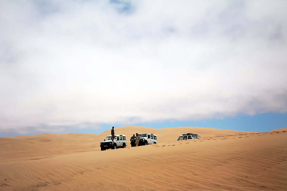 cars in the sand