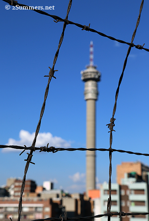 Hillbrow Tower through fence