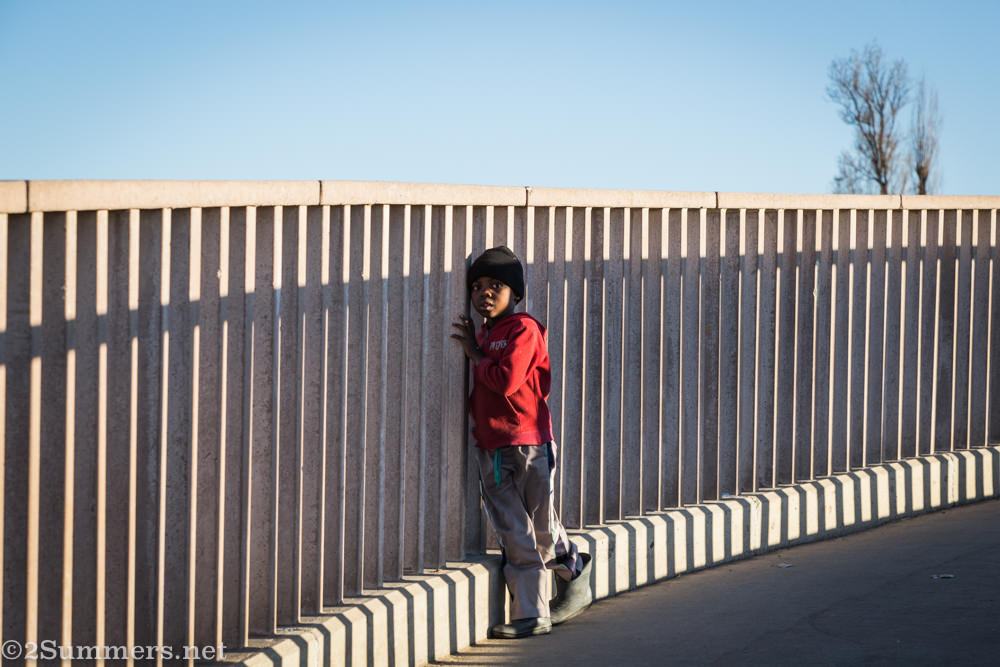 Child on bridge in Alex