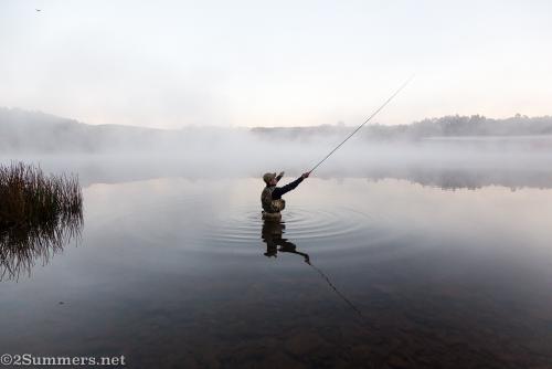 Man flyfishing in Stanford Lake