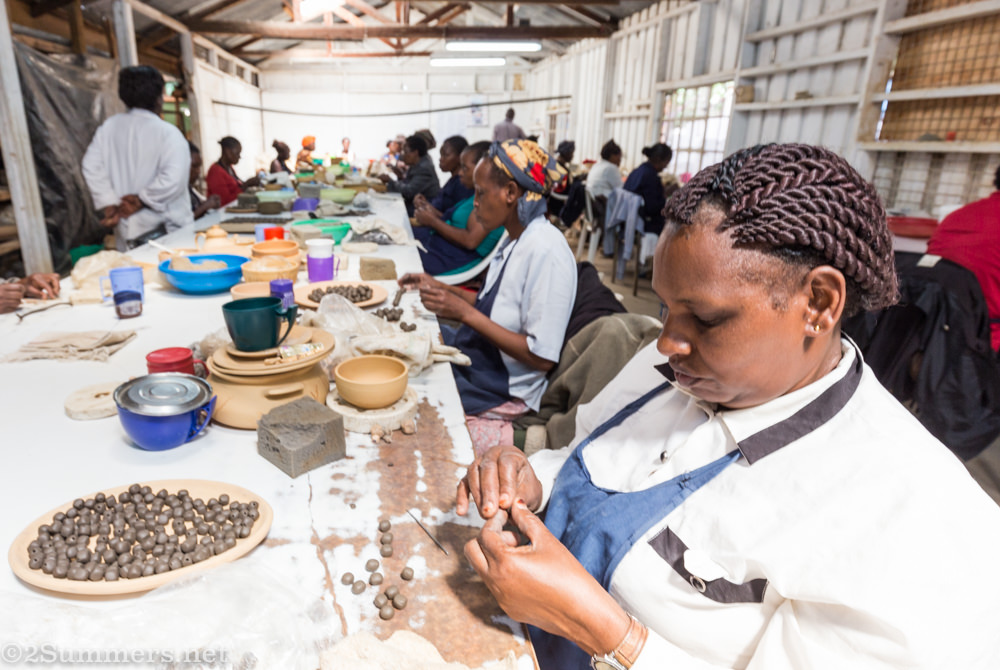 Women making beads at Kazuri