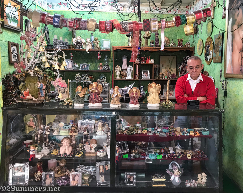 Angel salesman in Mercado Medellin