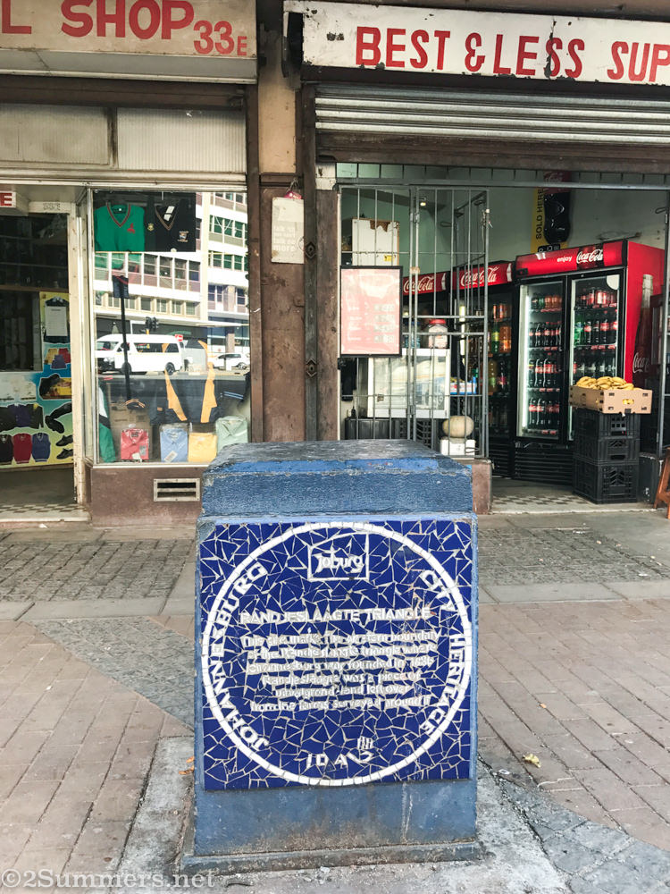 Historic mosaic outside Master Mansions