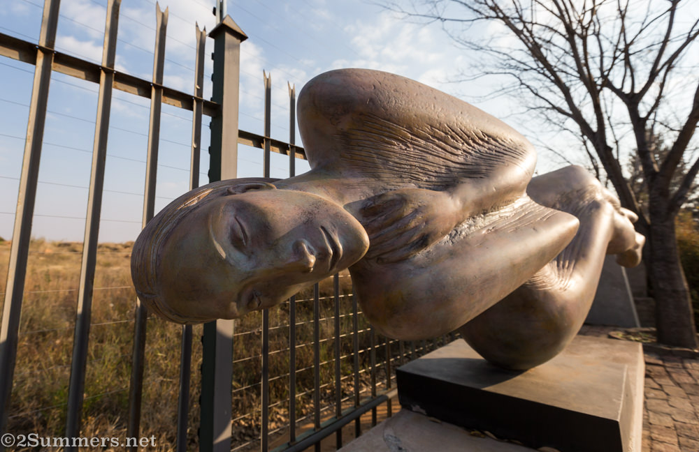 Stone sculpture of a sleeping woman