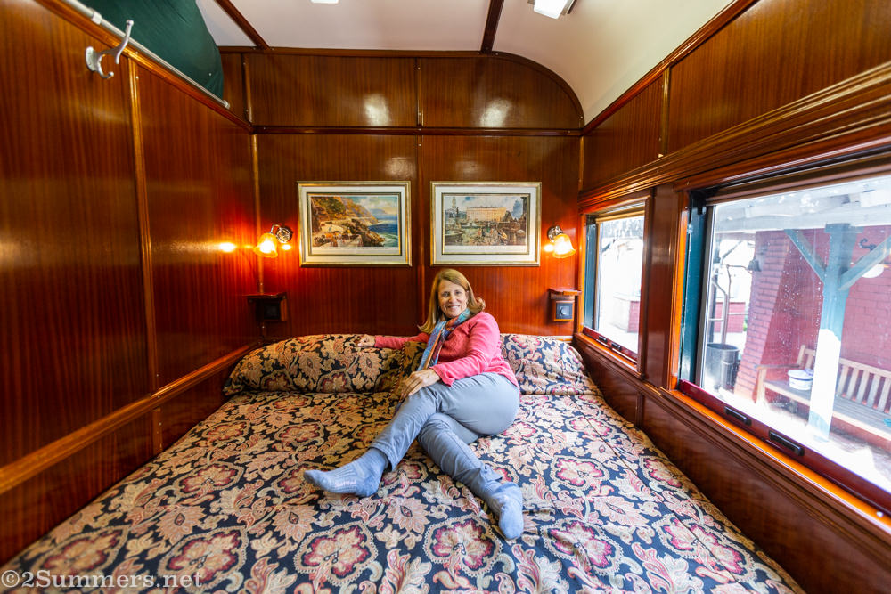 Mom on bed in Rovos suite