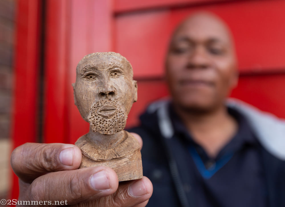 Americo Guambe and his miniature head
