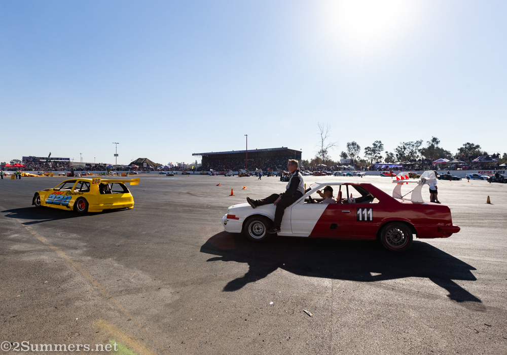 Cars driving around the track