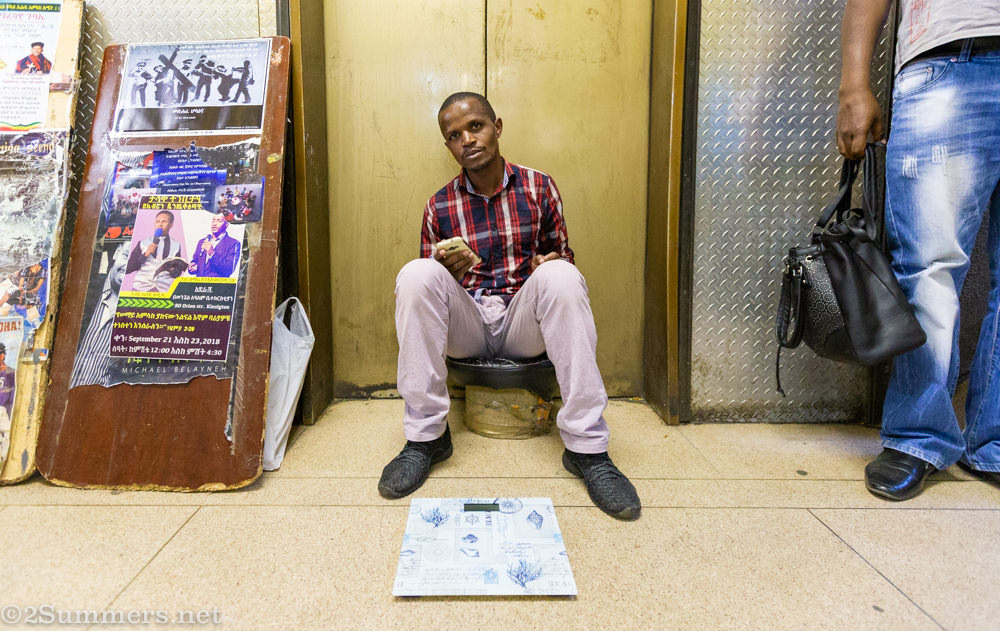 Guy with scale in Majesty Building