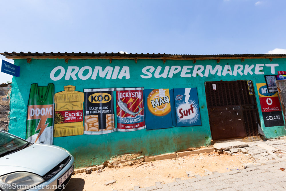 Classic sign-painting on a shop wall in Alexandra Township