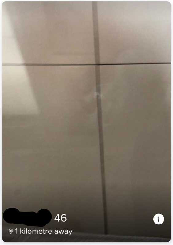 Tinder profile bare wall.