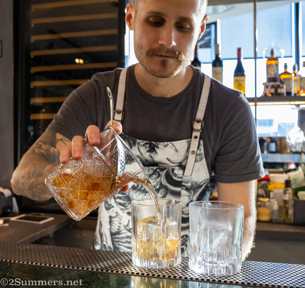 Devin Cross mixes cocktails at Mix Cocktail Bar in Rosebank.