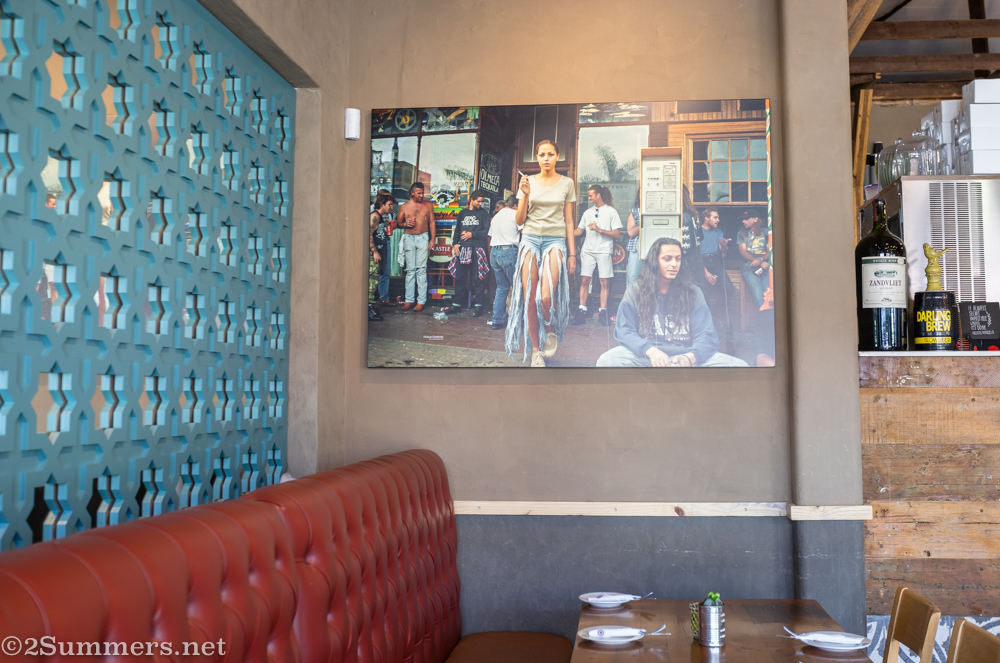 Photo of the Yeoville Ba-Pita hanging on the wall of the Melville Ba-Pita.