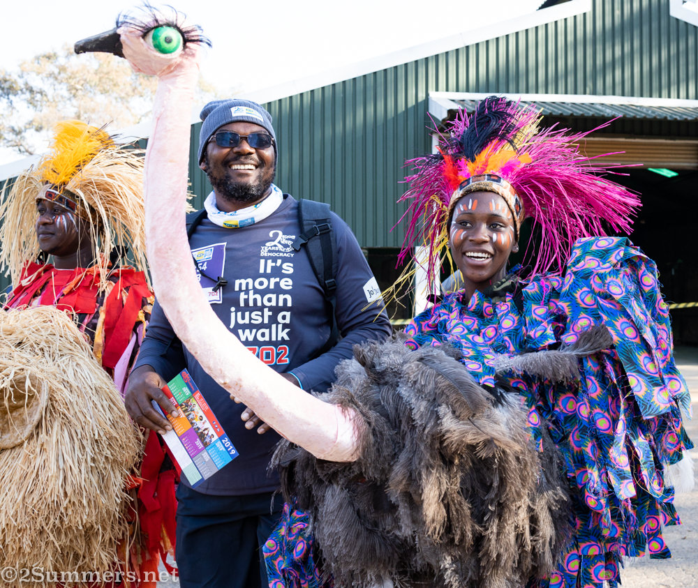 Woman dressed up like an ostrich in the Johannesburg Zoo.