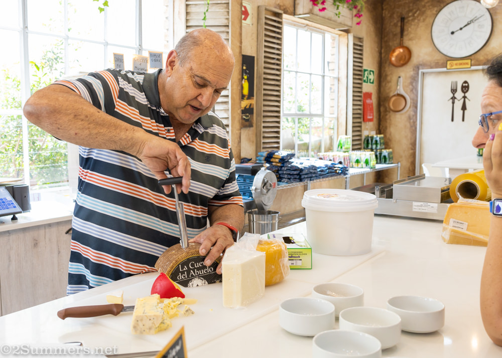 Steven cutting up cheese with wild abandon.