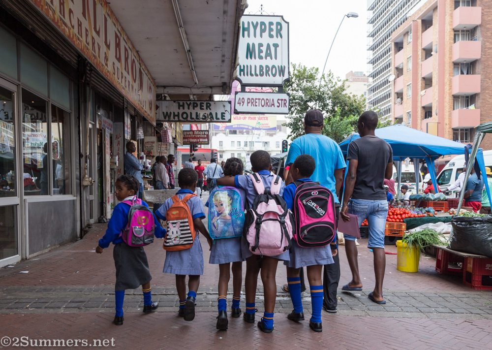 Kids walking home from school on Pretoria Street in Hillbrow
