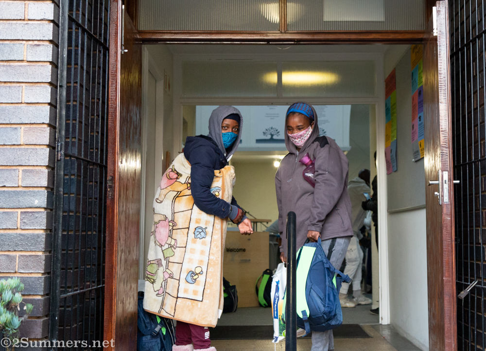 Ladies with backpacks and hot water bottle