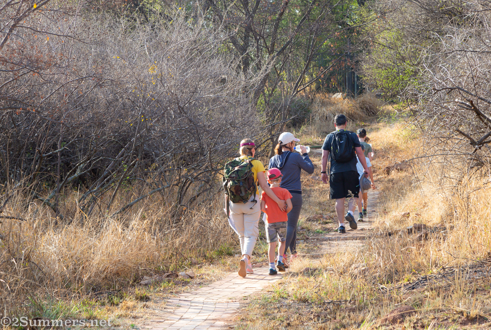 Family walking on the Melville Koppies