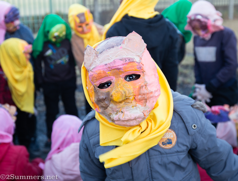 Masked child at the Brixton Burn.