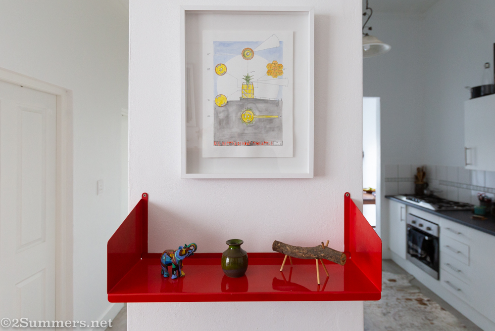 Red shelf and pineapple picture