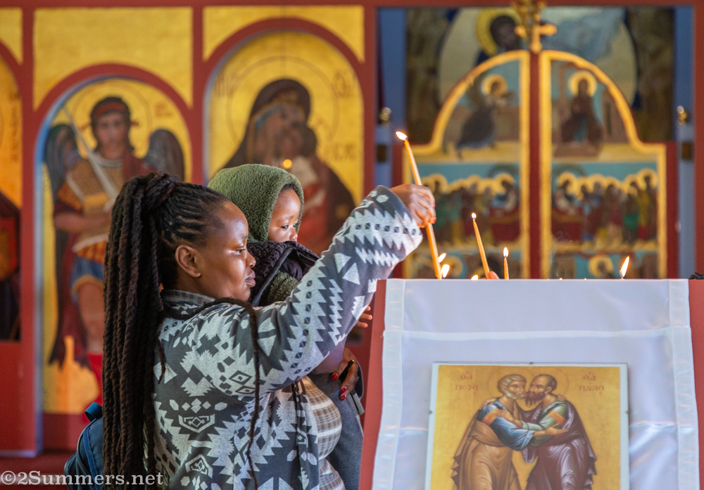 Lighting candles at St. Nicholas of Japan