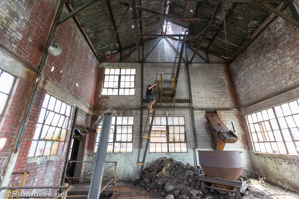 Thorsten climbing down a ladder in the Gas Works