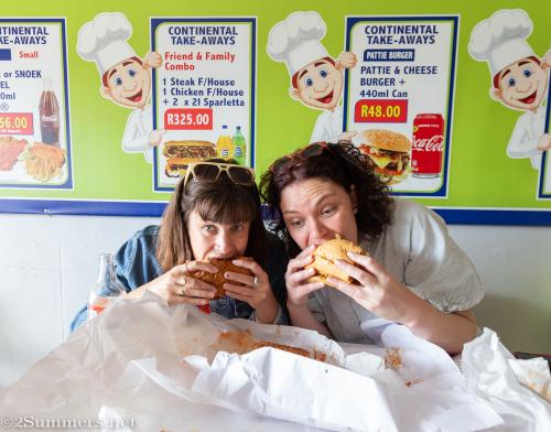 Heather and Dee eating Gatsby sandwiches