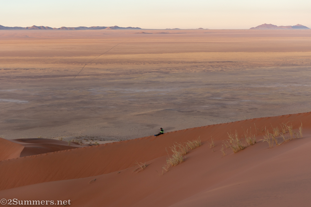 Andrew sitting on a dune