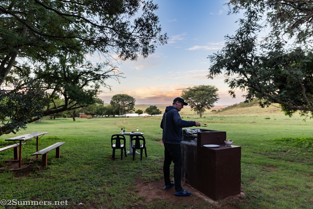 Thorsten braaing outside our chalet