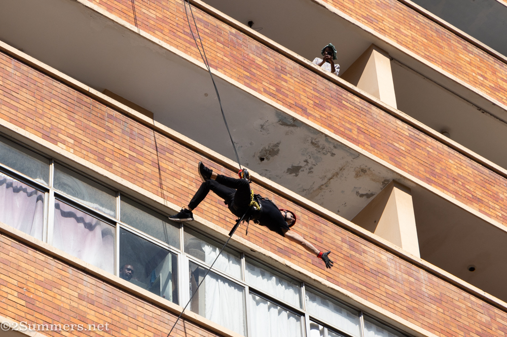 Repelling down a building in Hillbrow