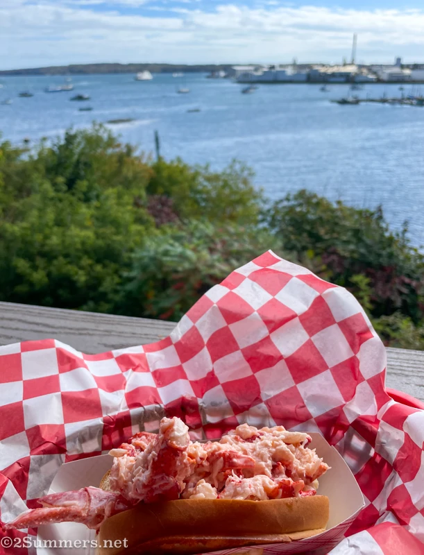 Lobster roll from Claws, with a view of the sea